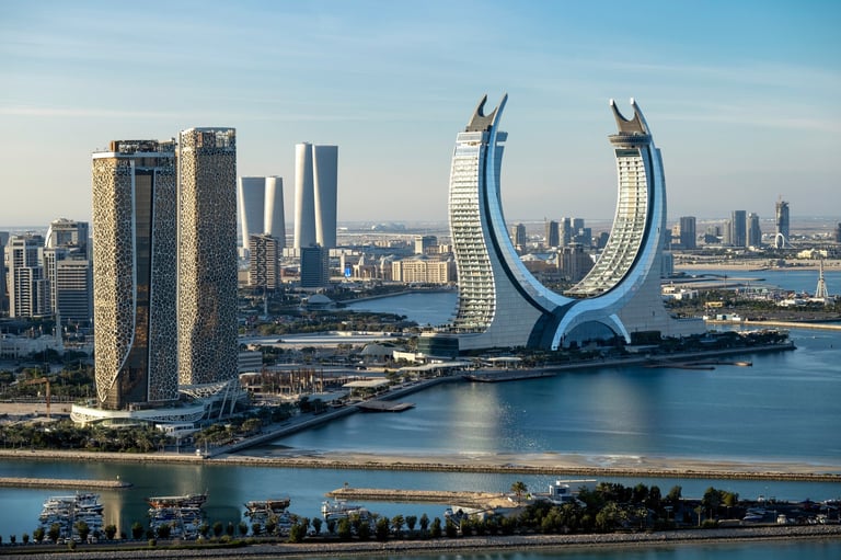 Lusail Qatar modern architecture Katara hotel view from Lusail Marina Park with crescent tower